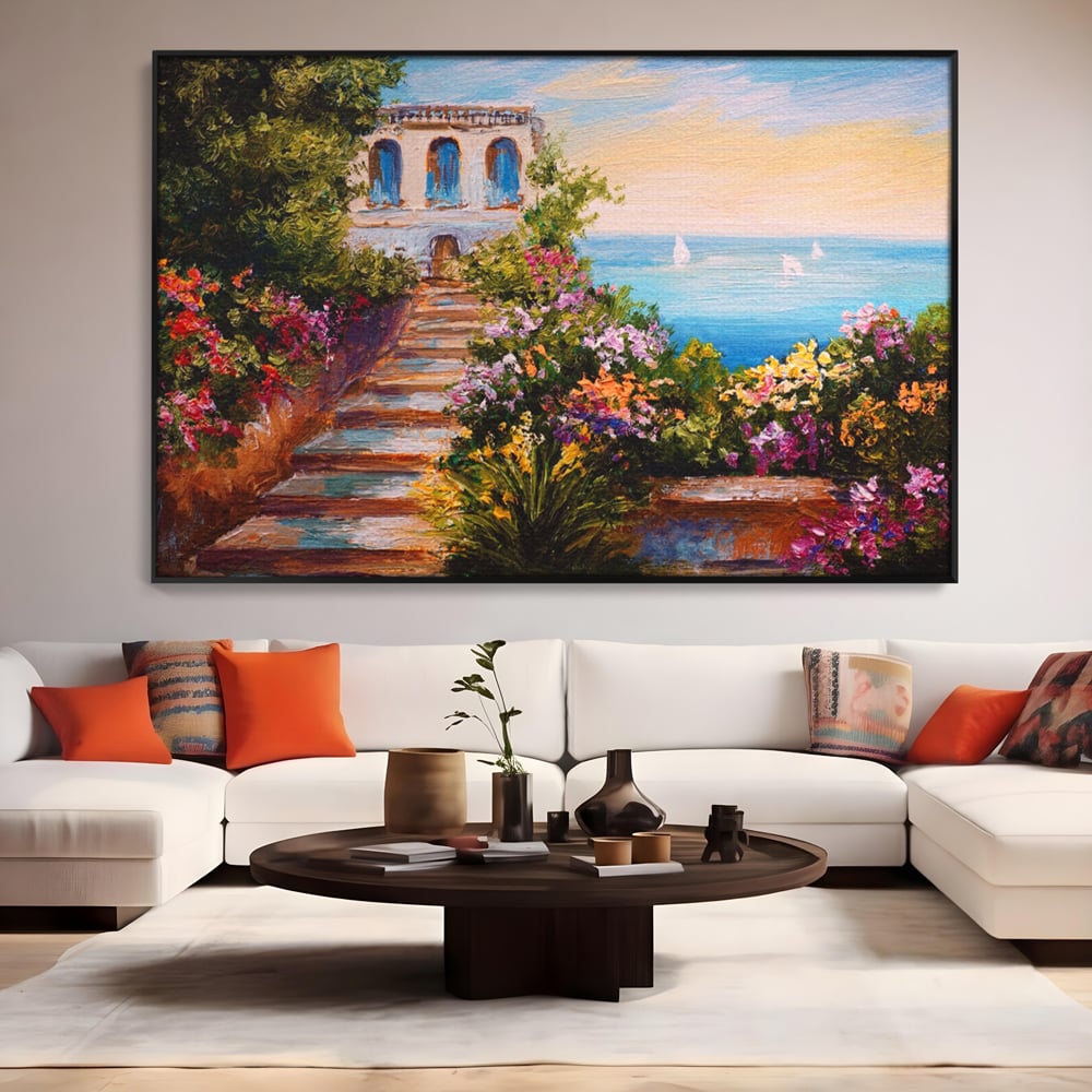 Tablou canvas cu pictura cu scari florale spre mare, in rama de aluminiu negru, pe perete intr-un living